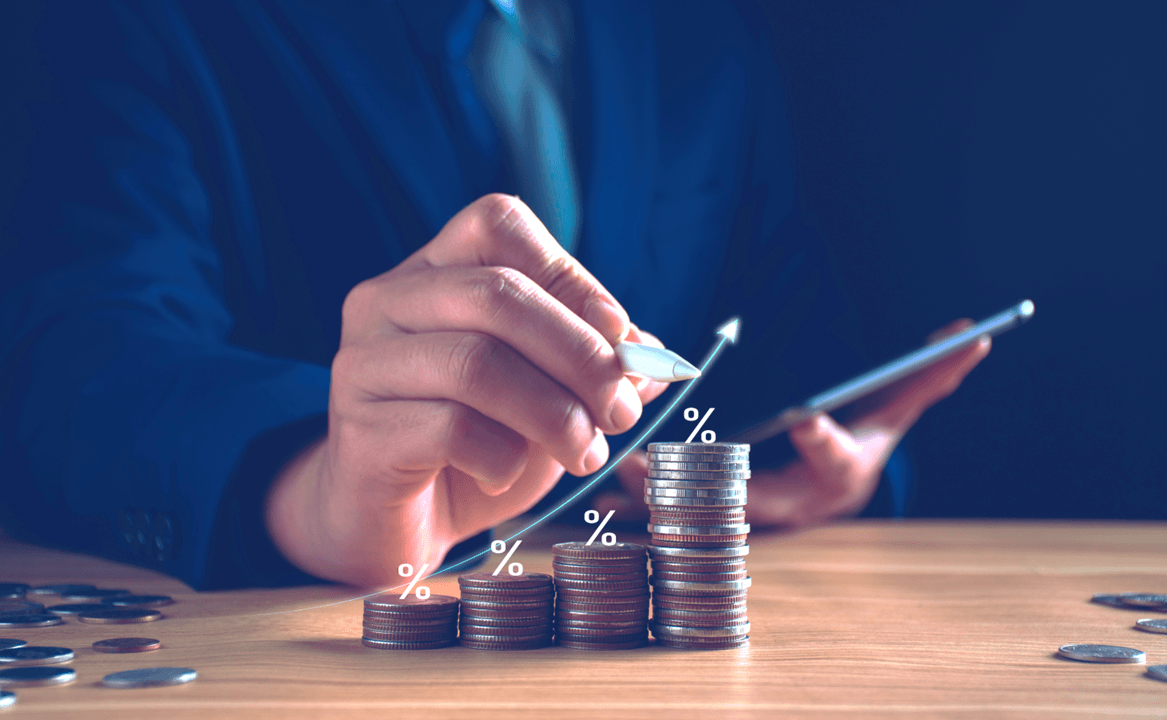a hand calculating money